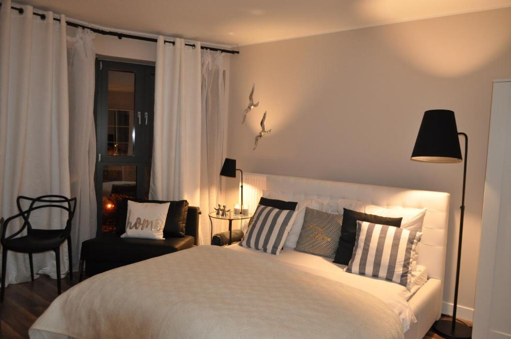Postel nebo postele na pokoji v ubytování Apartament Prestige & Sea Horyzont 613