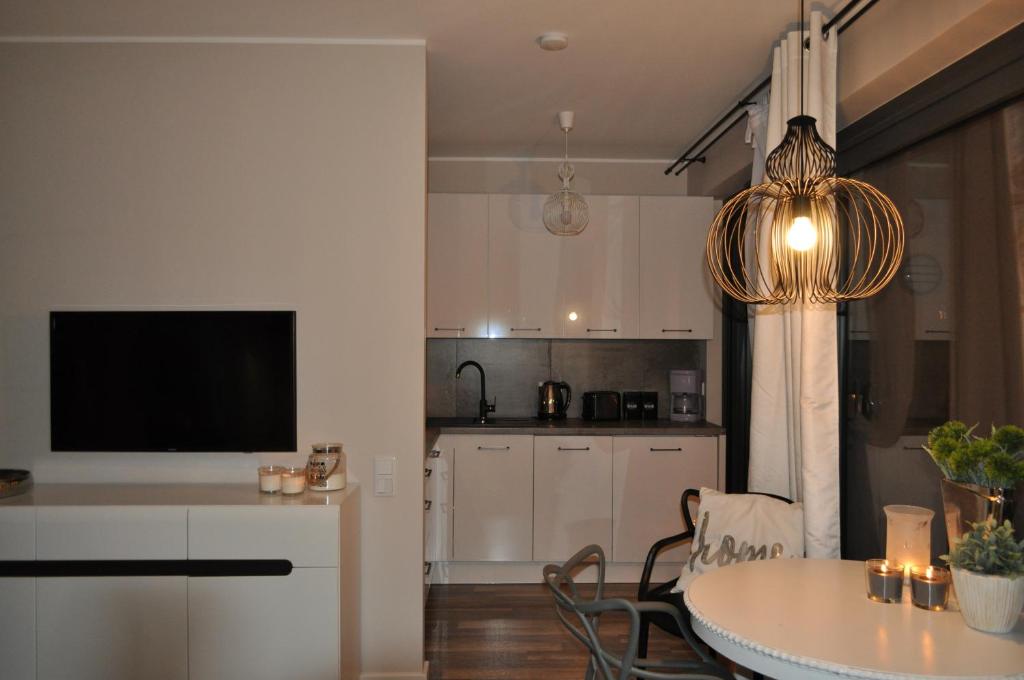 Kuchyň nebo kuchyňský kout v ubytování Apartament Prestige & Sea Horyzont 613