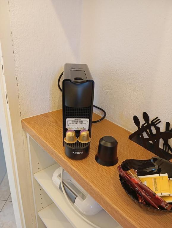 a phone sitting on top of a shelf at Maria I in Chorto