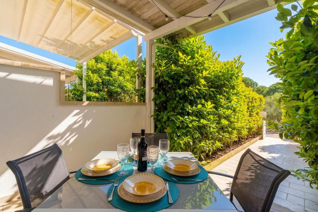 a table and chairs on the patio of a house at Villa I Gabbiani a Otranto in Otranto