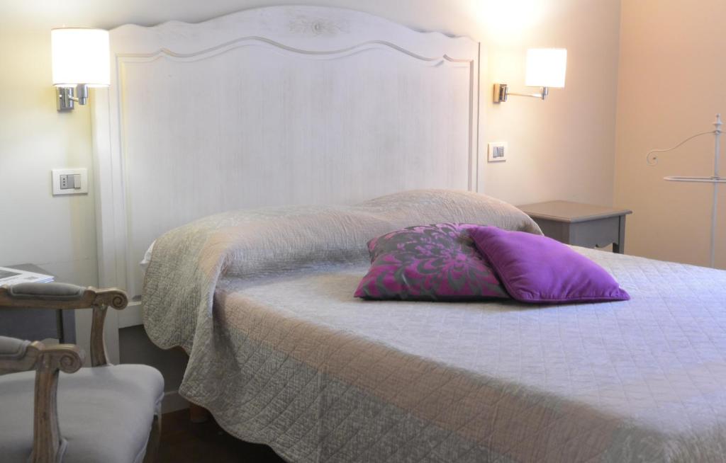 Posteľ alebo postele v izbe v ubytovaní Locanda Cece e Simo
