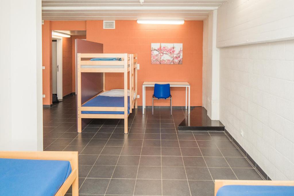 Postel nebo postele na pokoji v ubytování Hostel De Veurs