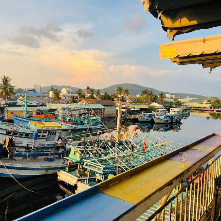 a group of boats docked in a harbor at Hotel View Sông Phú Quốc in Phú Quốc