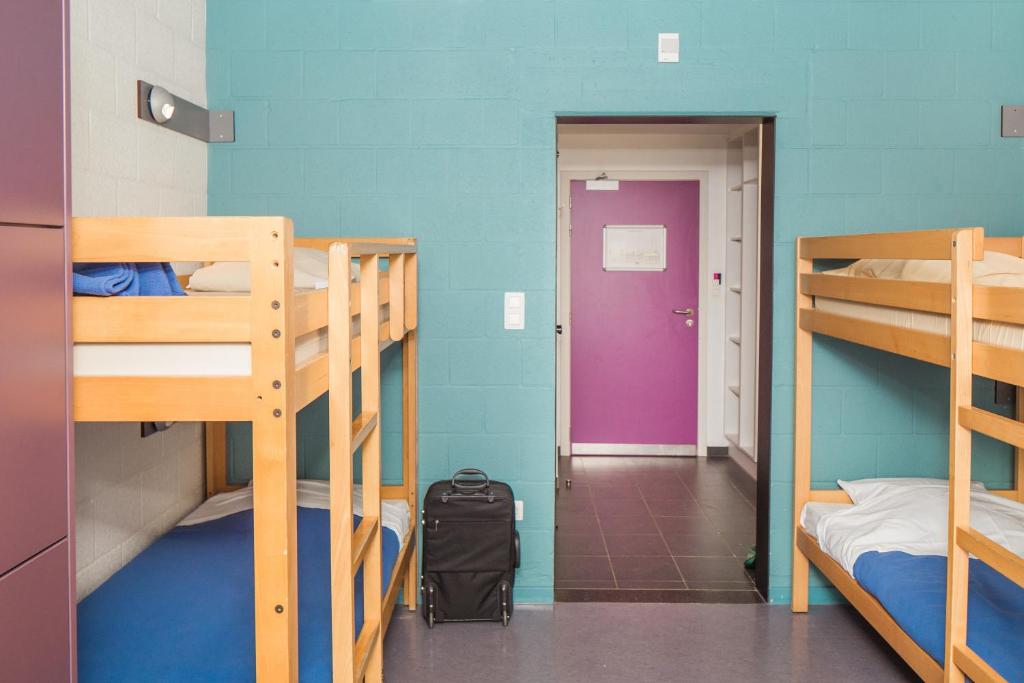 Postel nebo postele na pokoji v ubytování Hostel De Veurs