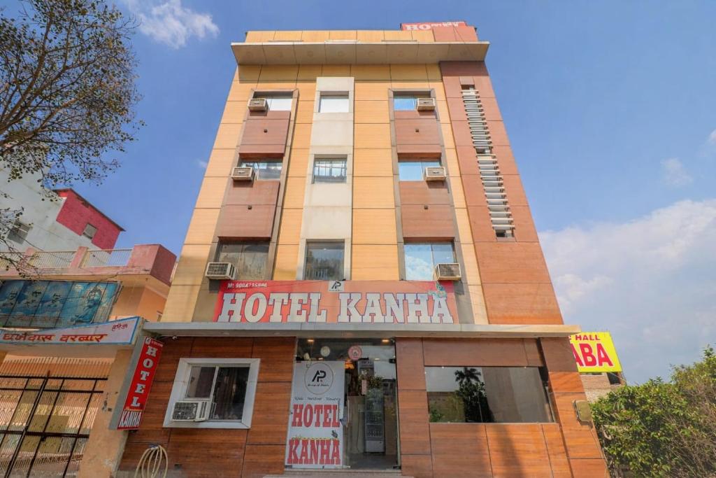 a hotel kennemia building with a sign on it at Hotel Kanha in Haridwār