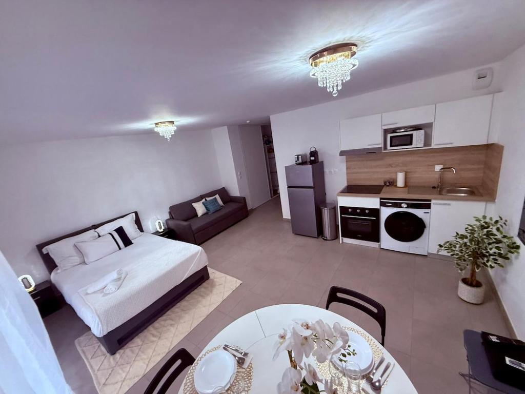Cosy Suite - standing, calme, arboré, parking, 15 min de la plage