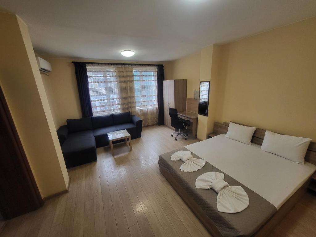O zonă de relaxare la Twain Apart&Rooms
