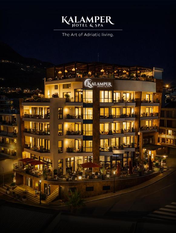 an image of a hotel at night at Kalamper Hotel & Spa in Dobra Voda