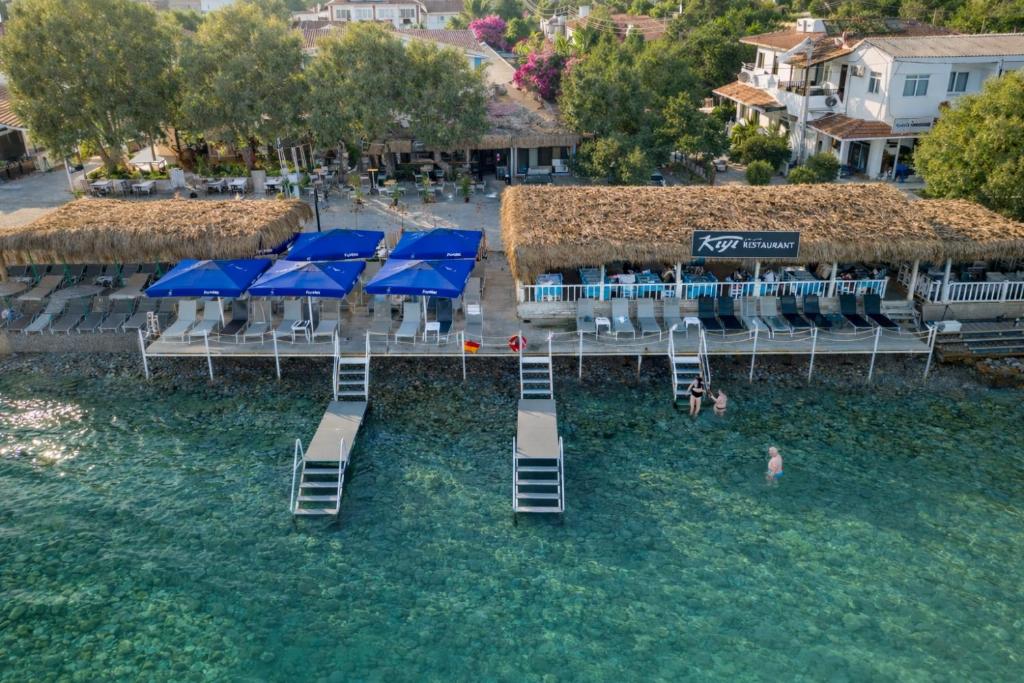an aerial view of a resort in the water at KIYI SUITES OTEL Palamutbükü in Yakaköy