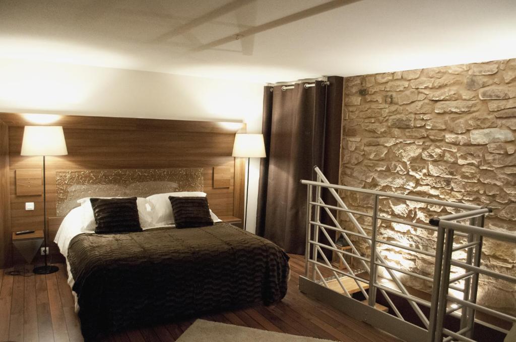 Postel nebo postele na pokoji v ubytování Chambres d'hôtes - L'Ecurie Obernai