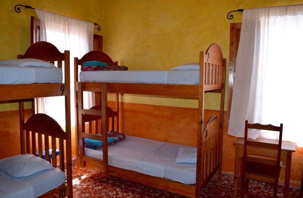 Voodi või voodid majutusasutuse Hostel Iguana Azul toas