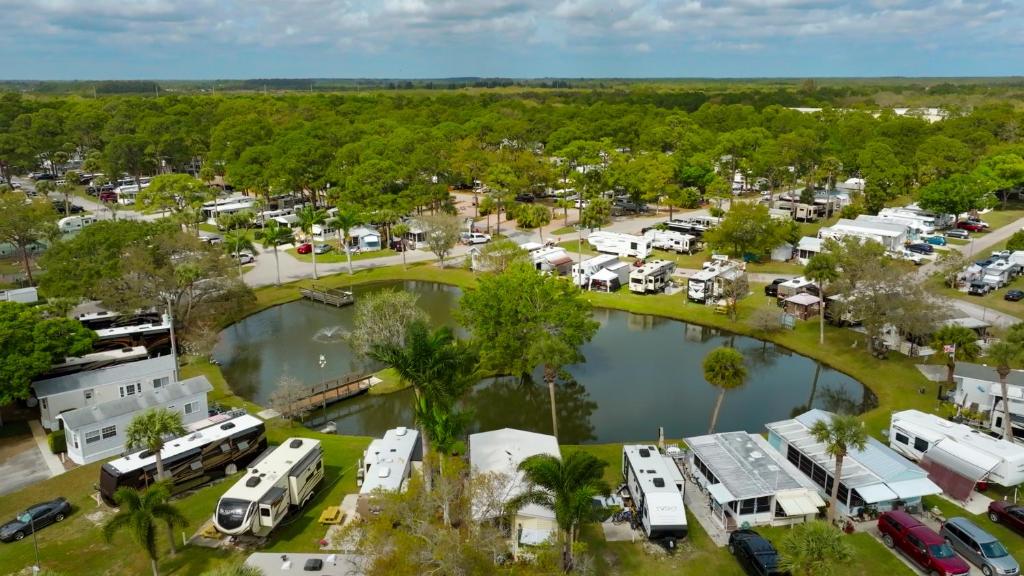 an aerial view of a parking lot at a campground at Road Runner Travel Resort in Fort Pierce