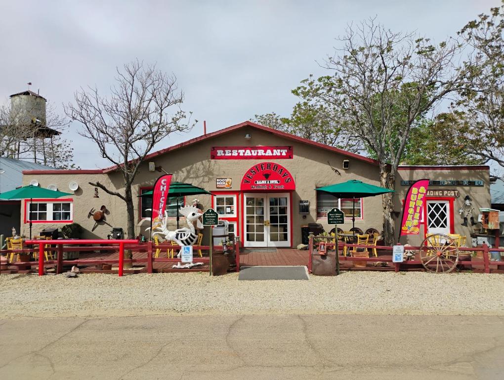 a restaurant with a sign on the front of it at Historic Sheps Miners Inn near Kingman, AZ in Chloride