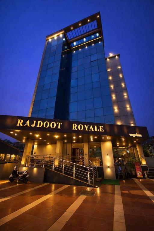 a building with a sign that reads raidot roxy at Hotel Rajdoot Royale by Ambai in Ichalkaranji