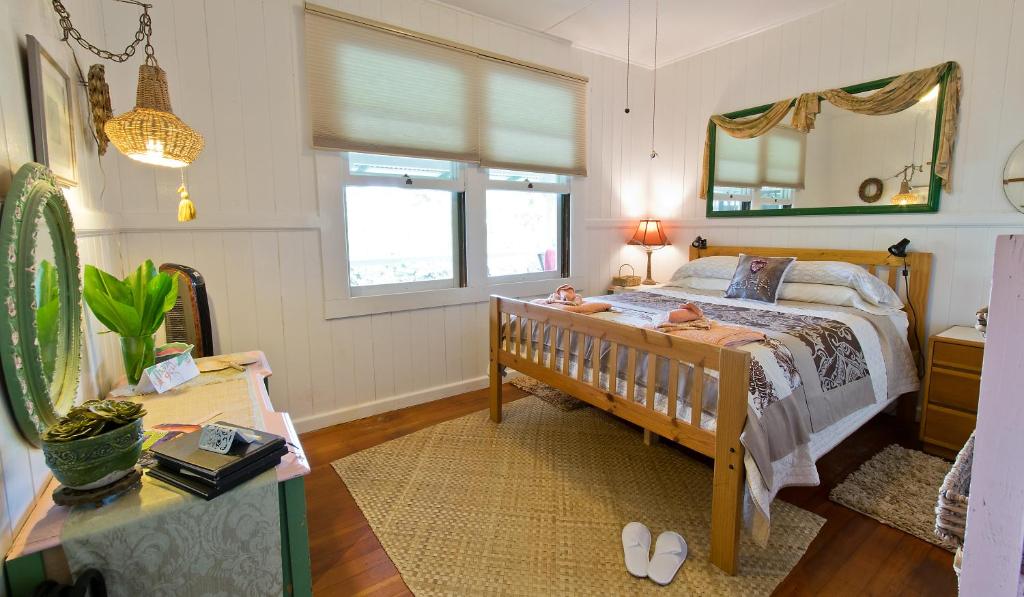 Postel nebo postele na pokoji v ubytování Hale Kawehi BnB Guesthouse