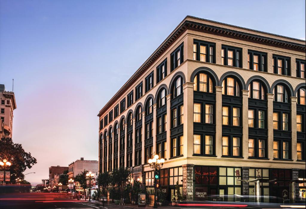 a large building on the corner of a street at Granger Hotel San Diego Downtown Gaslamp Quarter, a Member of Design Hotels in San Diego
