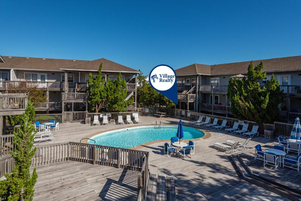 a pool at the villas at disney springs resort at Happy Ours in Corolla