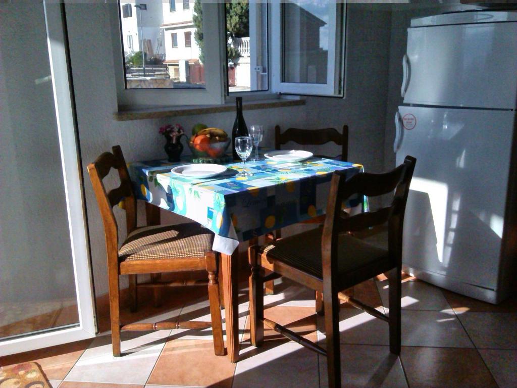 Kuchyňa alebo kuchynka v ubytovaní Apartments Cajic