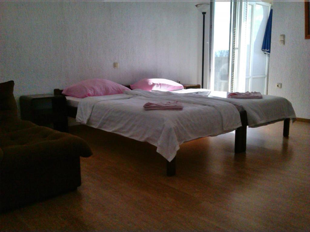 Posteľ alebo postele v izbe v ubytovaní Apartments Cajic