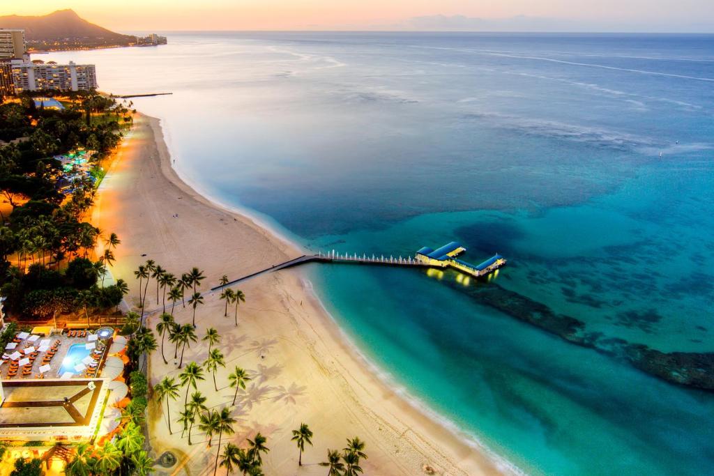 an aerial view of a beach and the ocean at Pagoda Hotel in Honolulu