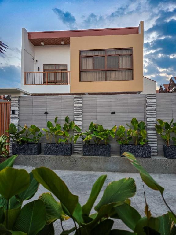 a house with plants in front of it at C Urban Villas 2 in Dau