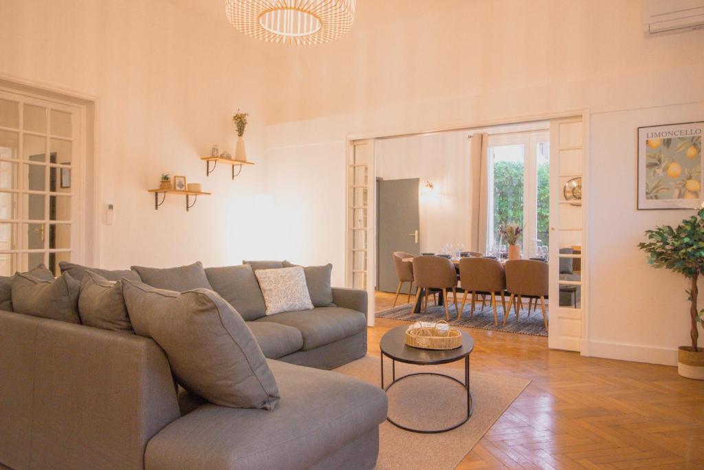 a living room with a couch and a table at Maison Vauban in Marseille