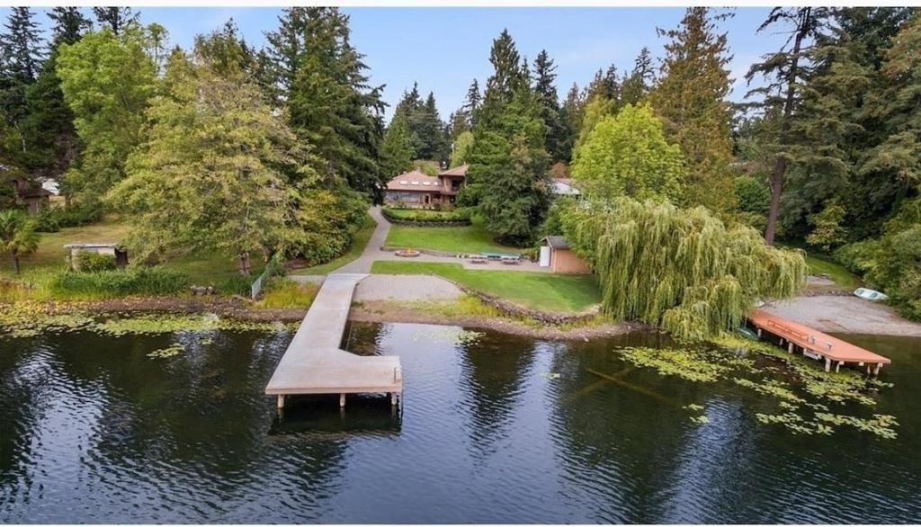 an aerial view of a lake with a bridge at Star Lake Shores in Kent