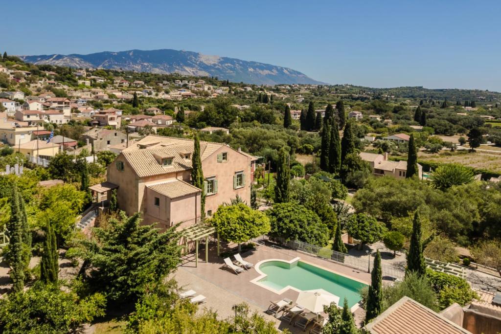an aerial view of a house with a swimming pool at Estrellas Luxury Villas in Svoronata