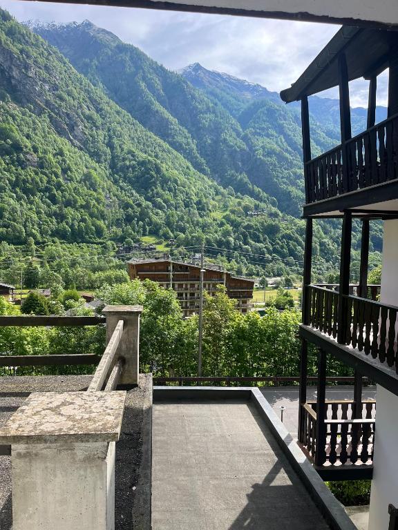 a balcony with a view of a mountain at Baita Trentin in Alagna Valsesia