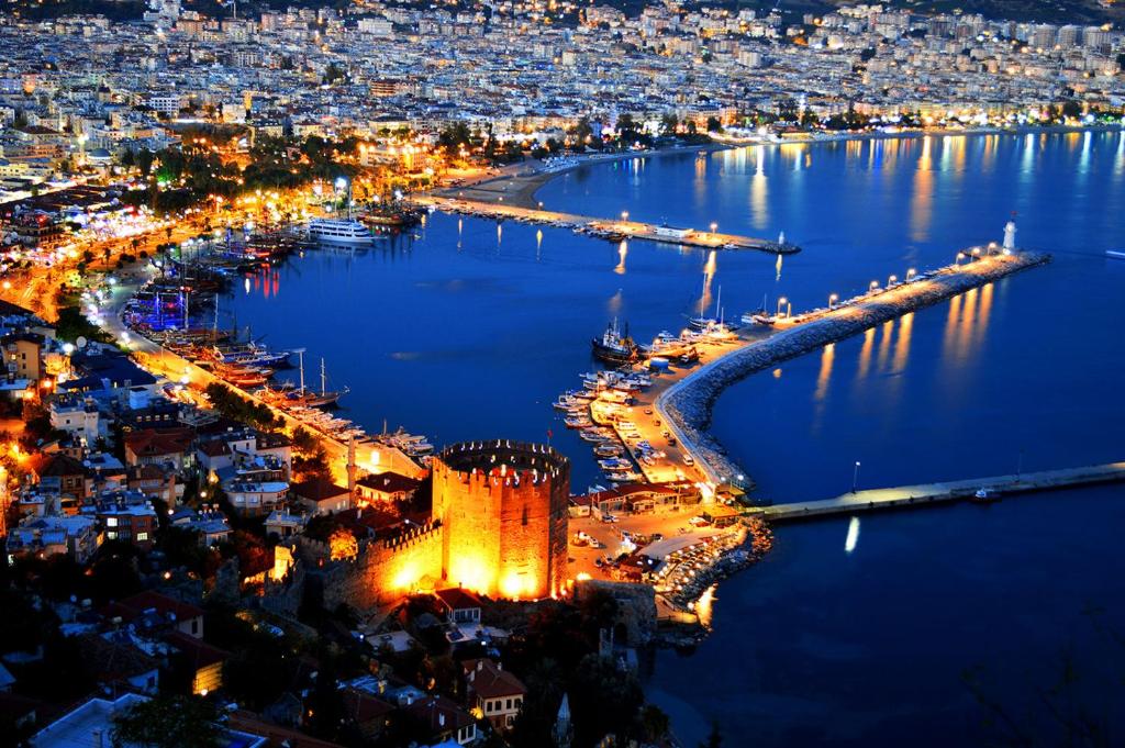 an aerial view of a city at night at Dreamy luxury duplex villa with a special view and 300 meters of private garden in Alanya