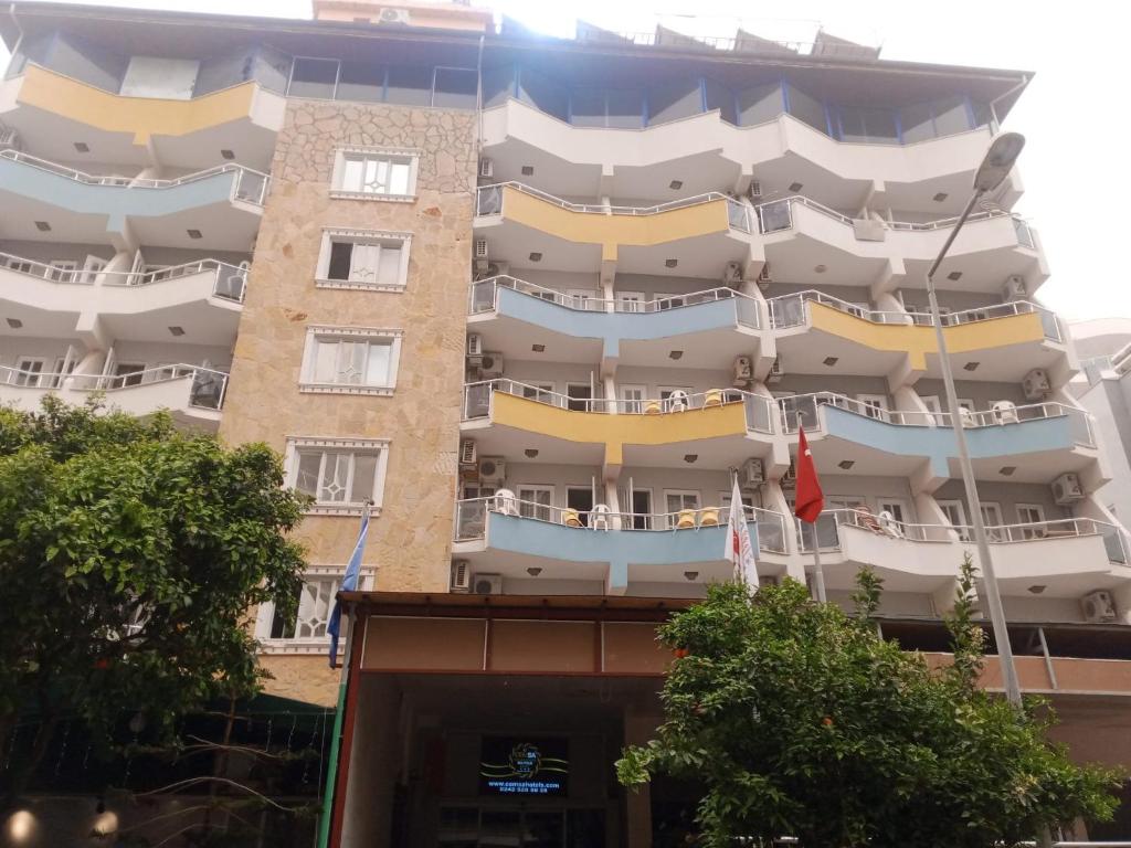a building with balconies on the side of it at Hotel Cems Sunparadise in Alanya