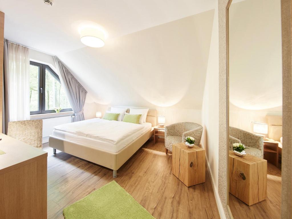 Postel nebo postele na pokoji v ubytování Rodelhaus