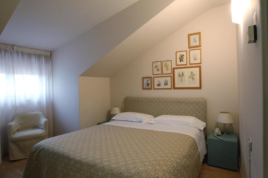 Postel nebo postele na pokoji v ubytování Hotel Globo