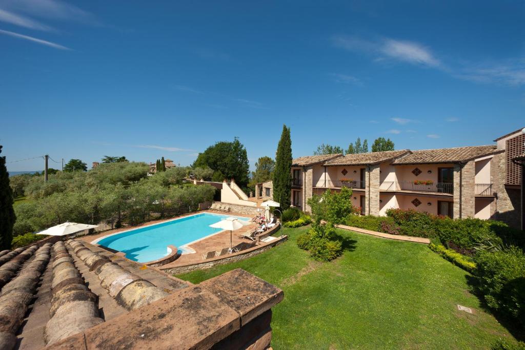 Bazén v ubytování Relais Il Canalicchio Country Resort & SPA nebo v jeho okolí