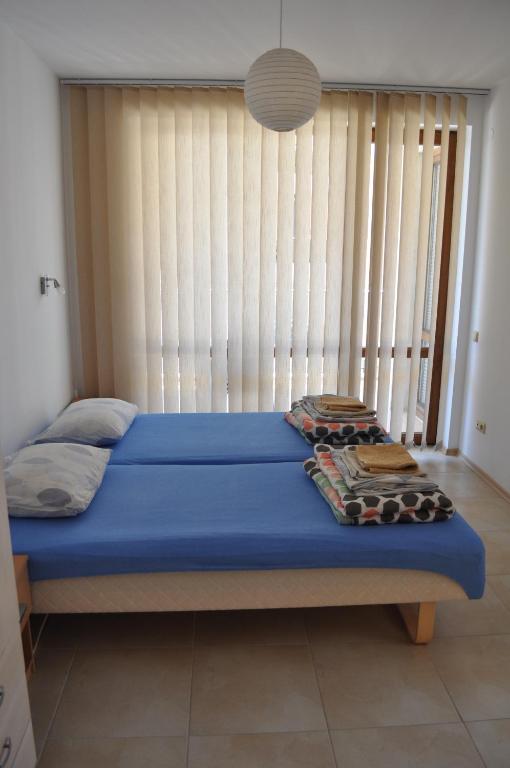 Postel nebo postele na pokoji v ubytování Villa Sun Village Byala