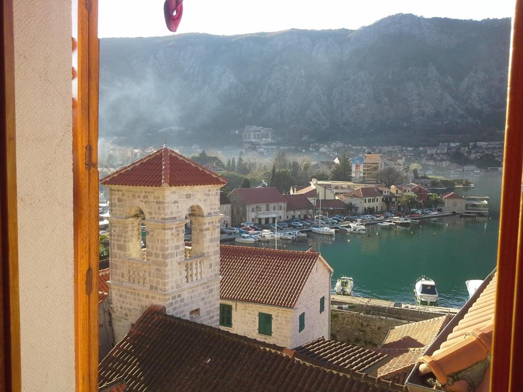 a view of a harbor with boats in the water at Studios Kono in Kotor