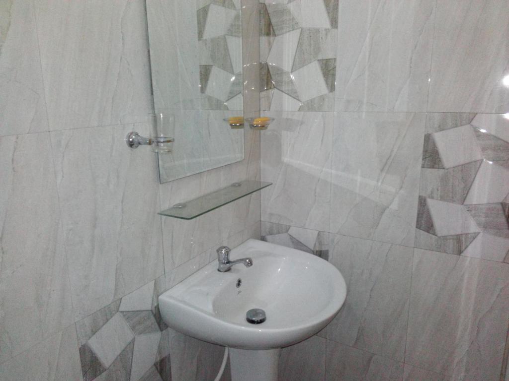 Koupelna v ubytování Diyawara Home Stay