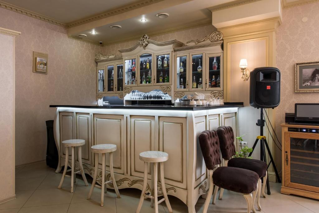 Kuchyň nebo kuchyňský kout v ubytování Premium Hotel