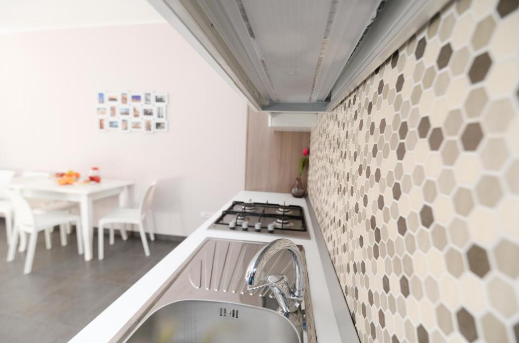 Kuchyň nebo kuchyňský kout v ubytování Casa Malaclà B&B