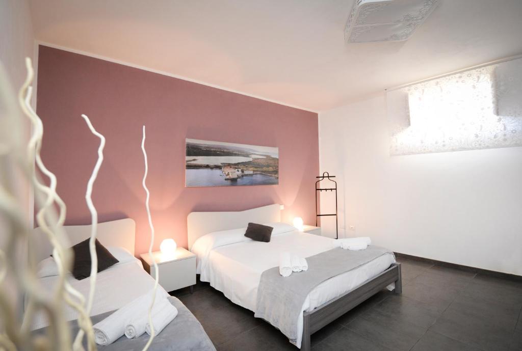 Postel nebo postele na pokoji v ubytování Casa Malaclà B&B