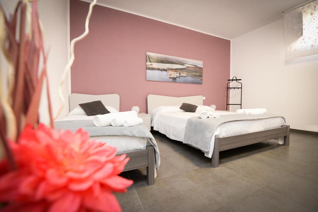 Postel nebo postele na pokoji v ubytování Casa Malaclà B&B