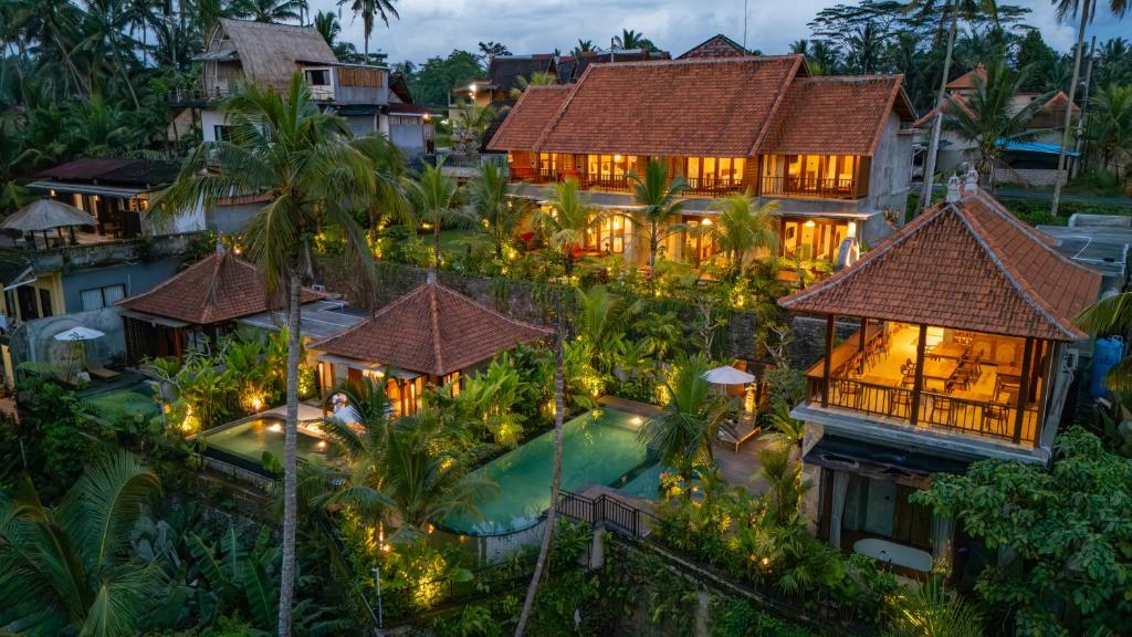 an aerial view of a resort with a swimming pool at The Dura Ubud in Ubud