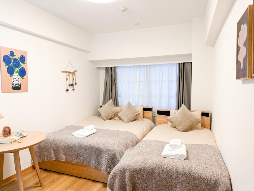 JR Shin-Osaka 1 min Airport direct Namba Umeda USJ direct 2 beds 3 people Wet and dry separation and kitchen