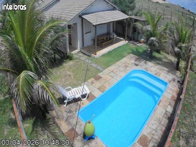 an overhead view of a swimming pool in front of a house at Moreira's paradise in Taíba