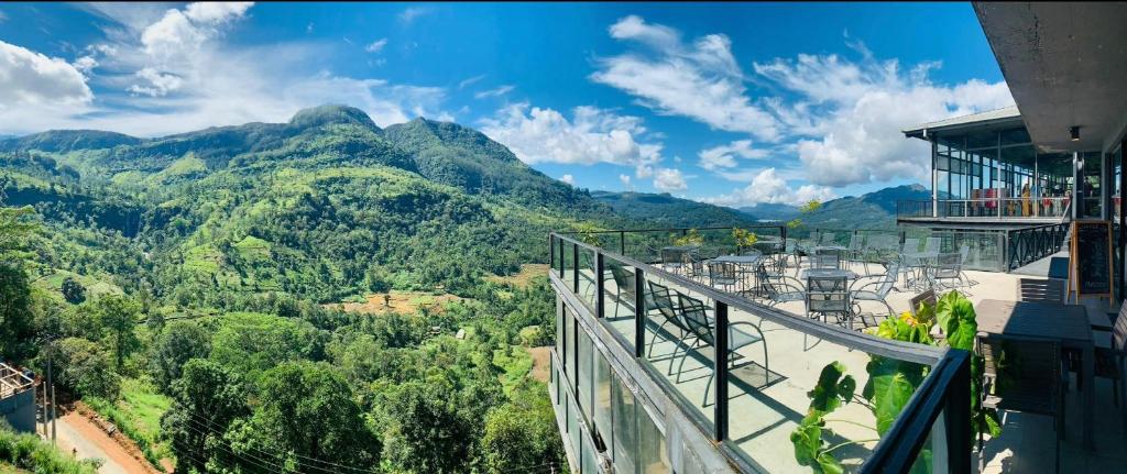 a view of the mountains from the balcony of a building at Oak Ray Tea Bush in Ramboda