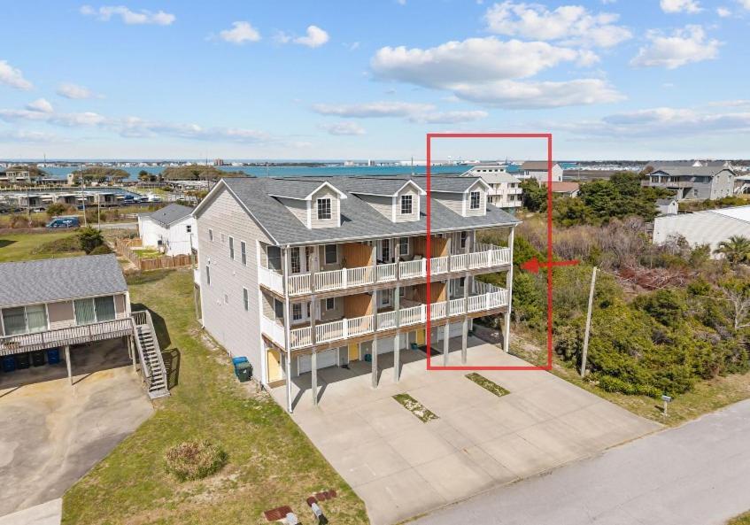 an aerial view of a house with a basketball hoop at Oceanwalk in Atlantic Beach