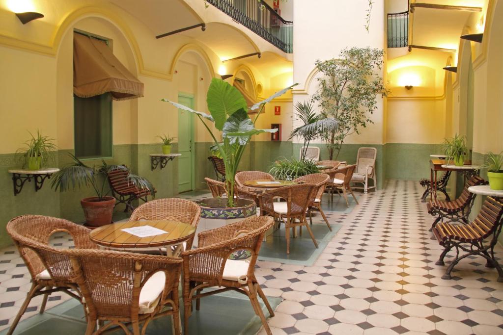 Reštaurácia alebo iné gastronomické zariadenie v ubytovaní Hotel Peninsular