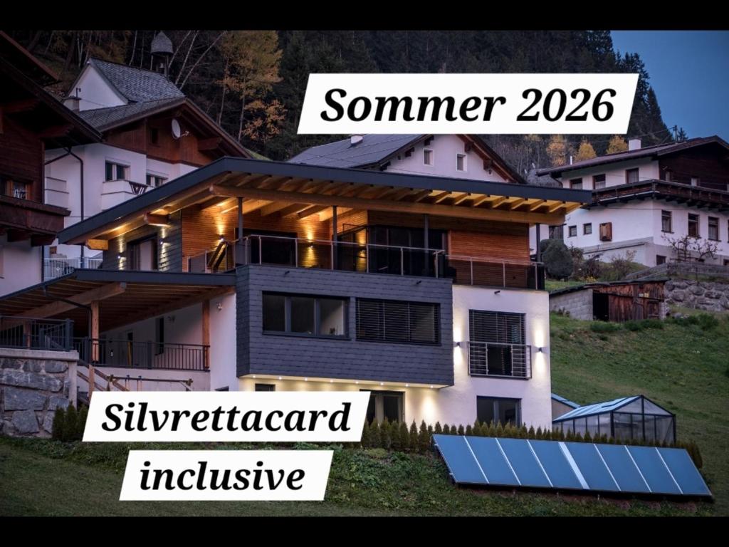a house with a solar panel in front of it at Apart Thurner in Kappl
