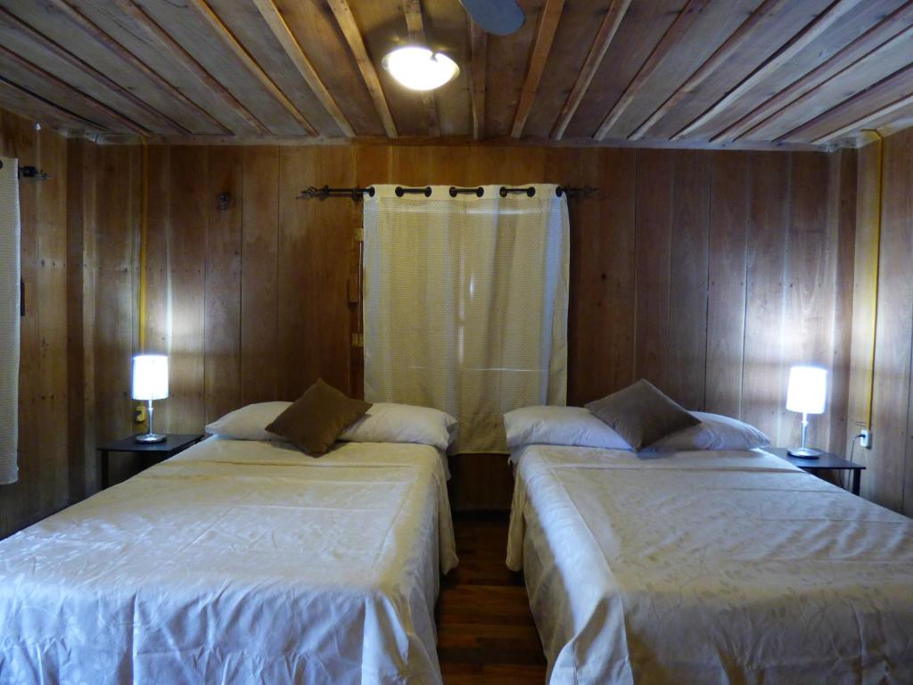 Postel nebo postele na pokoji v ubytování Cabañas Zoh Laguna Calakmul