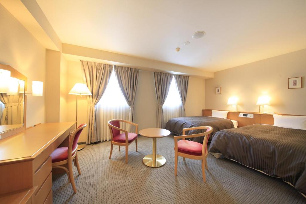 Postel nebo postele na pokoji v ubytování Hotel Morschein